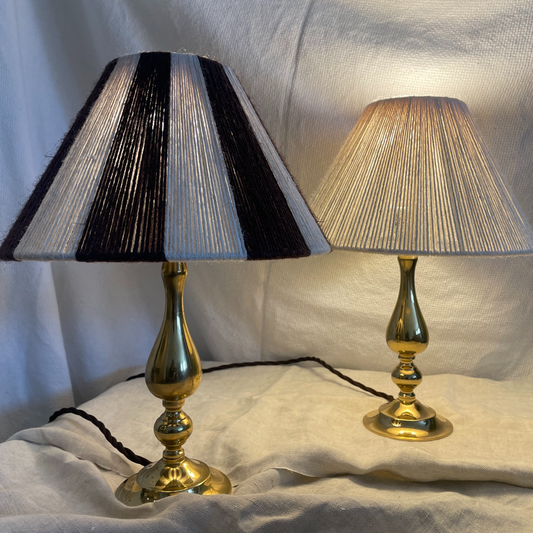 Pair of antiqued brass droplet lights
