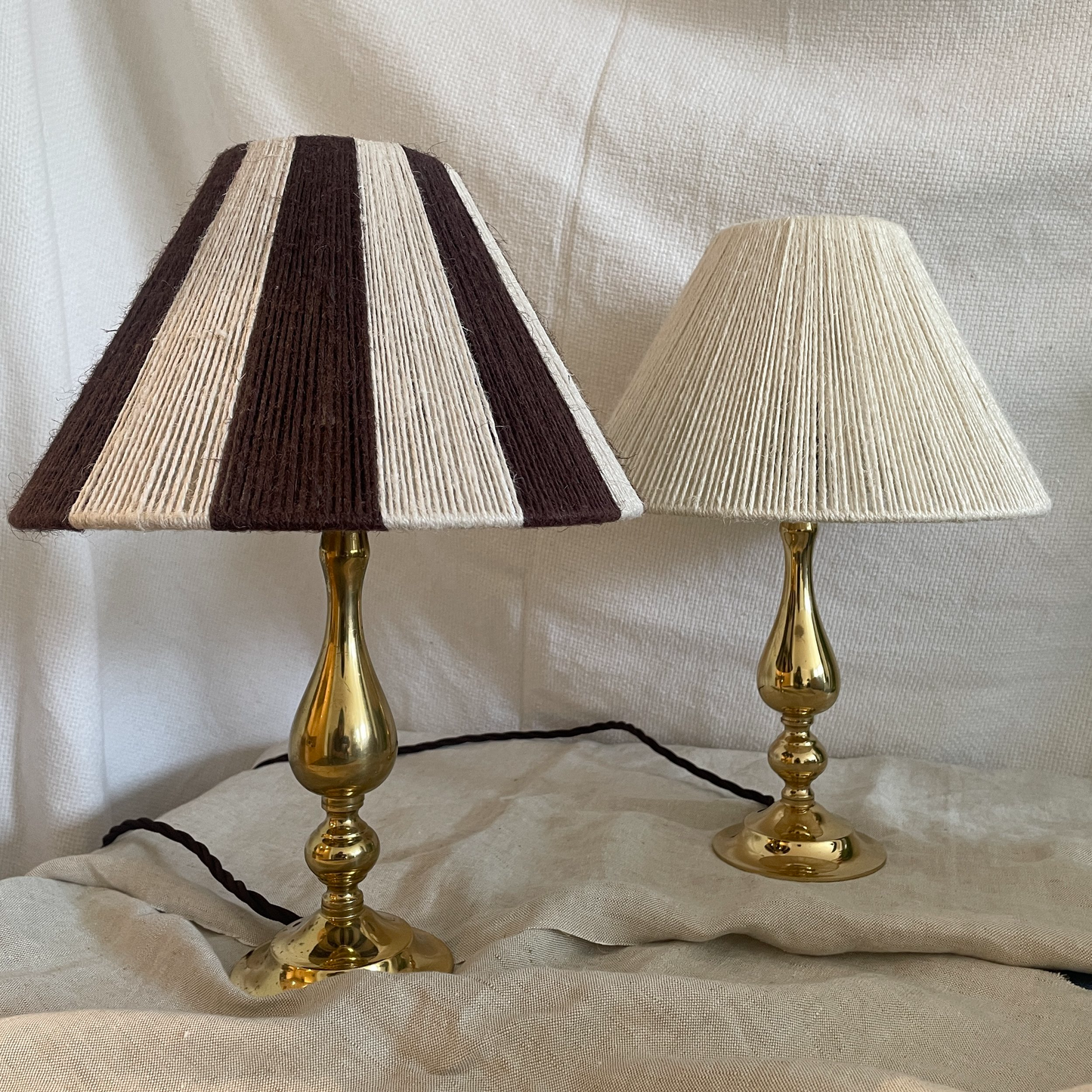 Pair of antiqued brass droplet lights