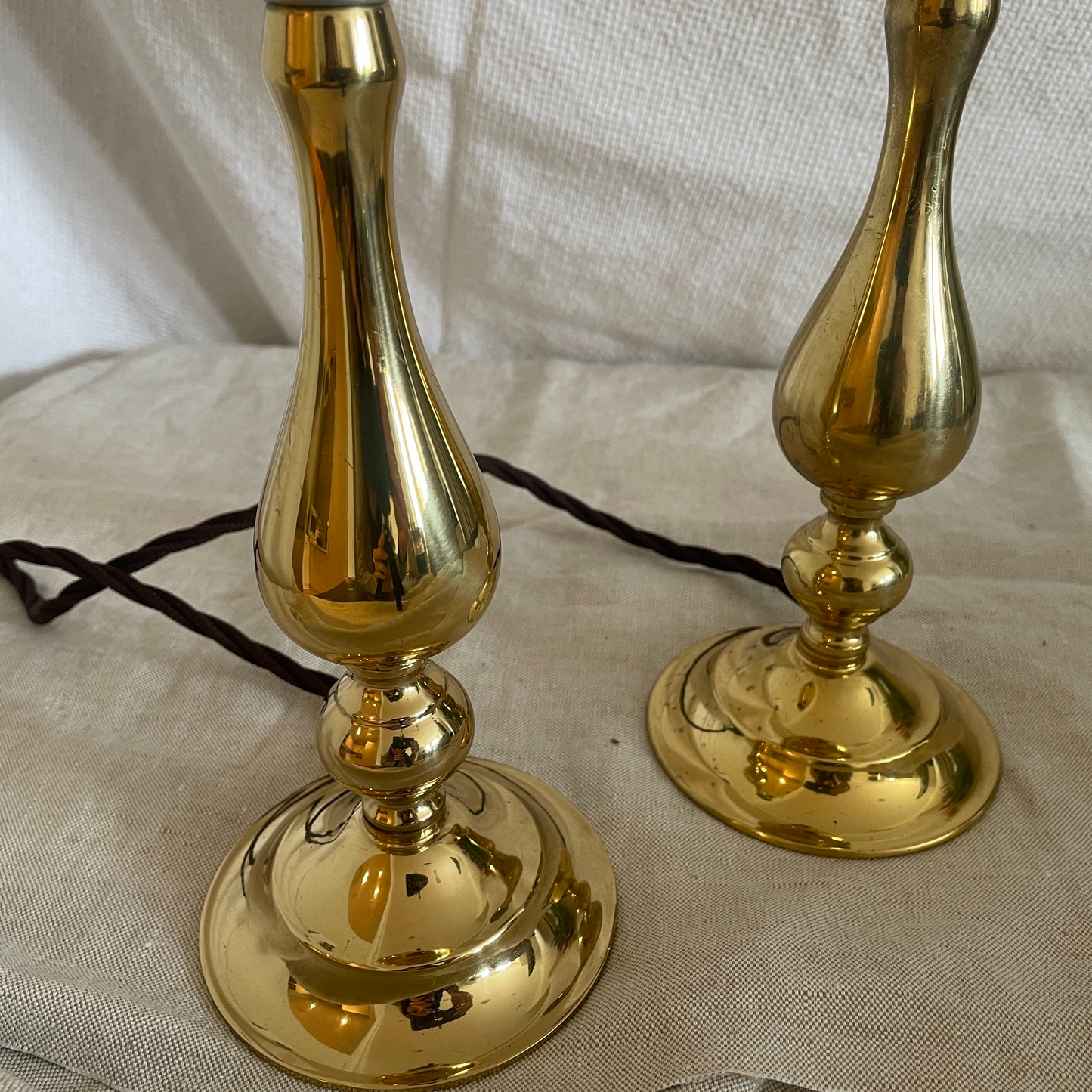 Pair of antiqued brass droplet lights