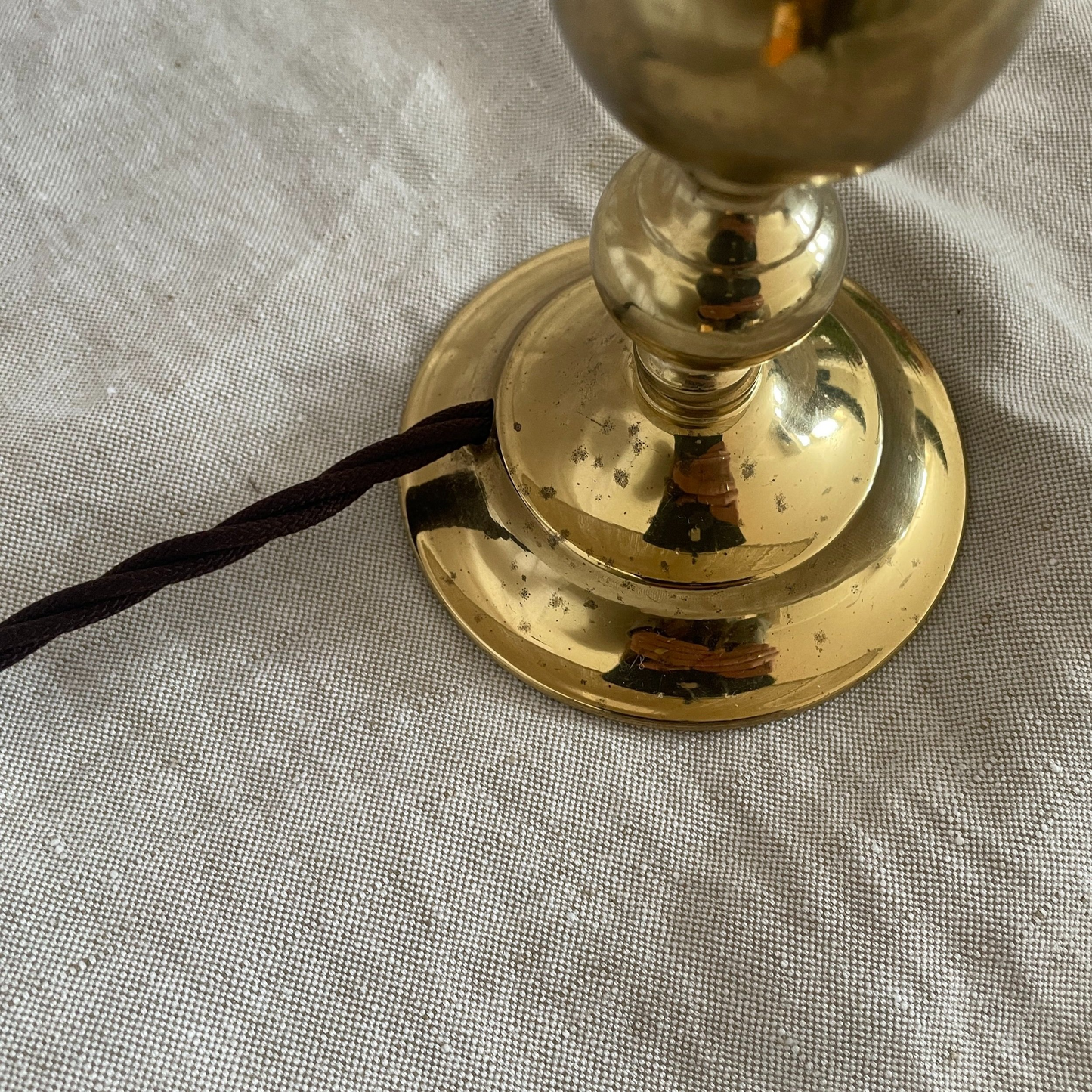 Pair of antiqued brass droplet lights
